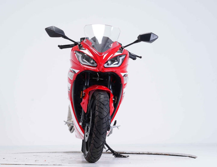 Red motorcycle on a white background