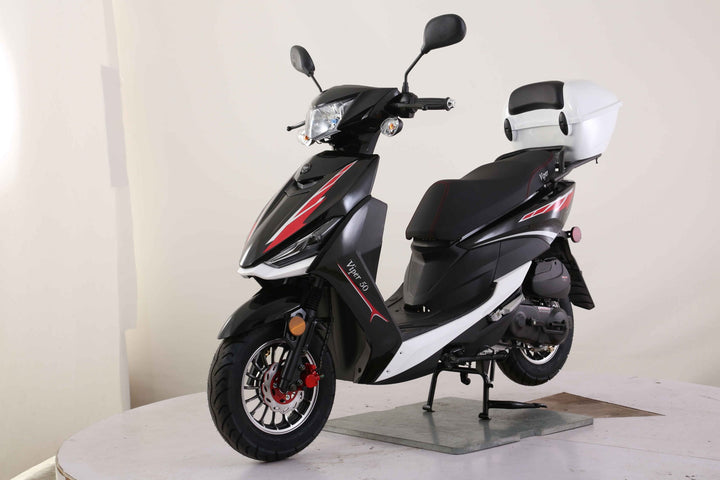 Black and white scooter on a white platform with a white background Scooter Moped Street legal for adults