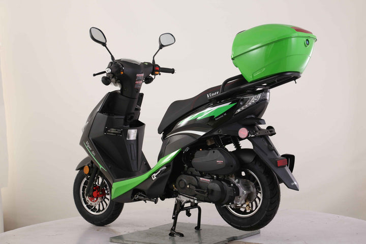 Green and black scooter on a white background Scooter Moped Street legal for adults
